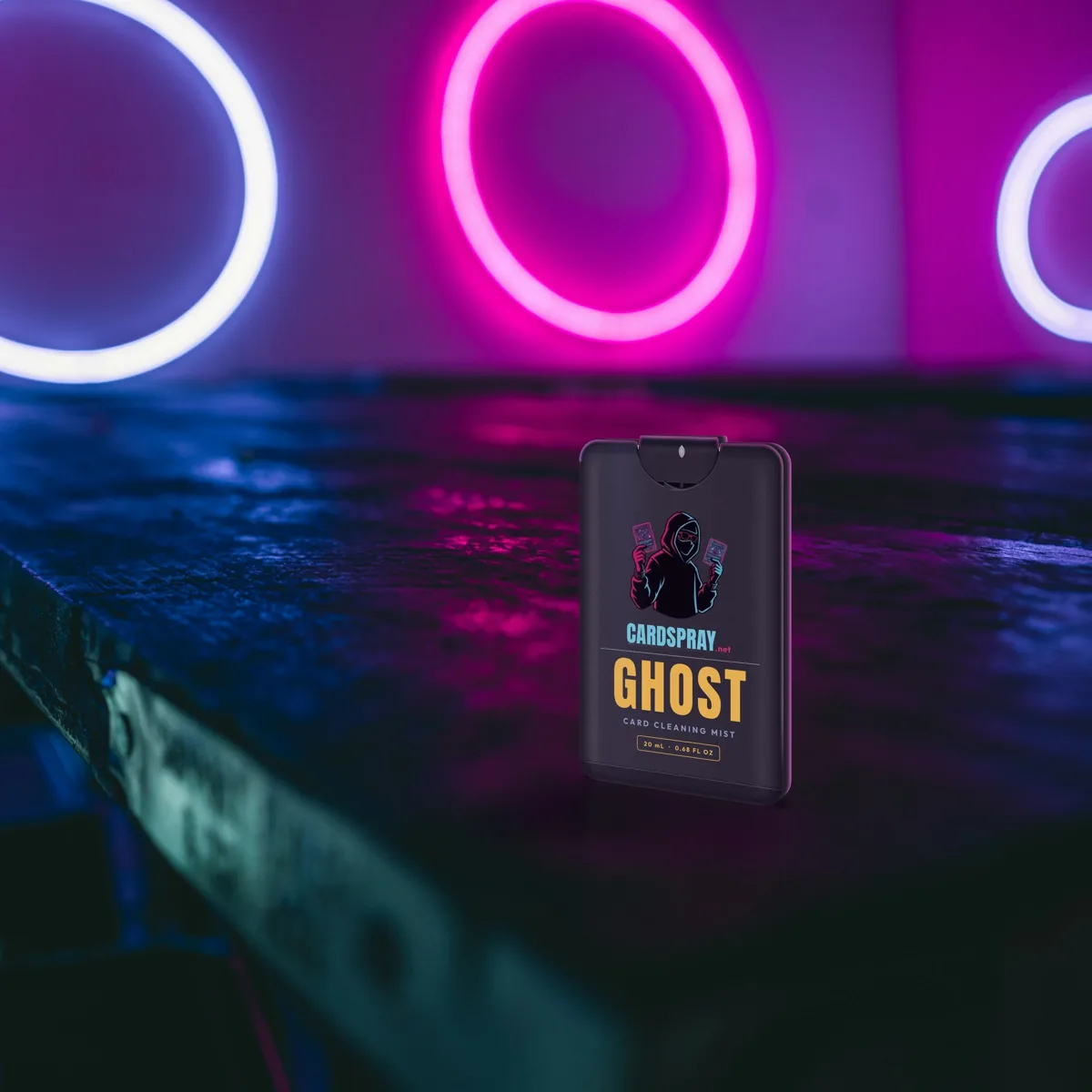 GHOST black bottle on a neon-lit table